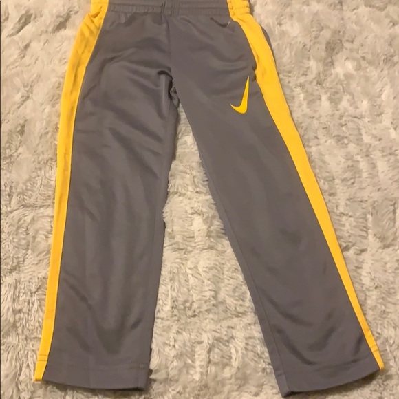 yellow nike sweatpants